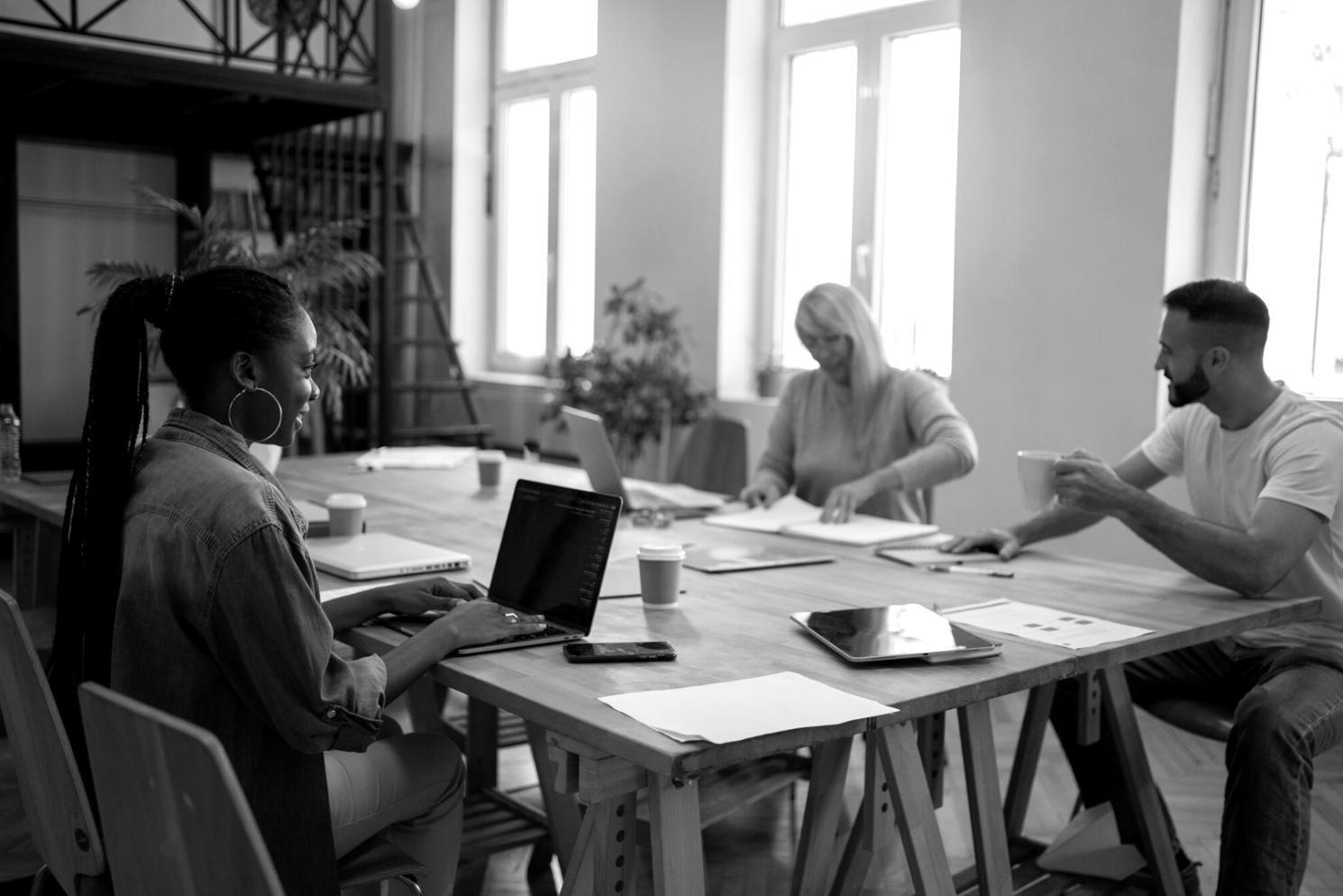 Security testing environment with multiple monitors showing vulnerability assessment tools